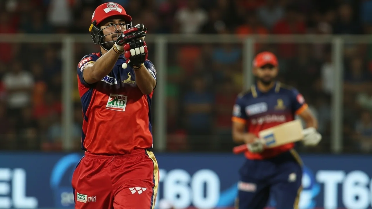 A key batter in white kit plays a controlled drive off the front foot in T20 match action with a fielder visible behind